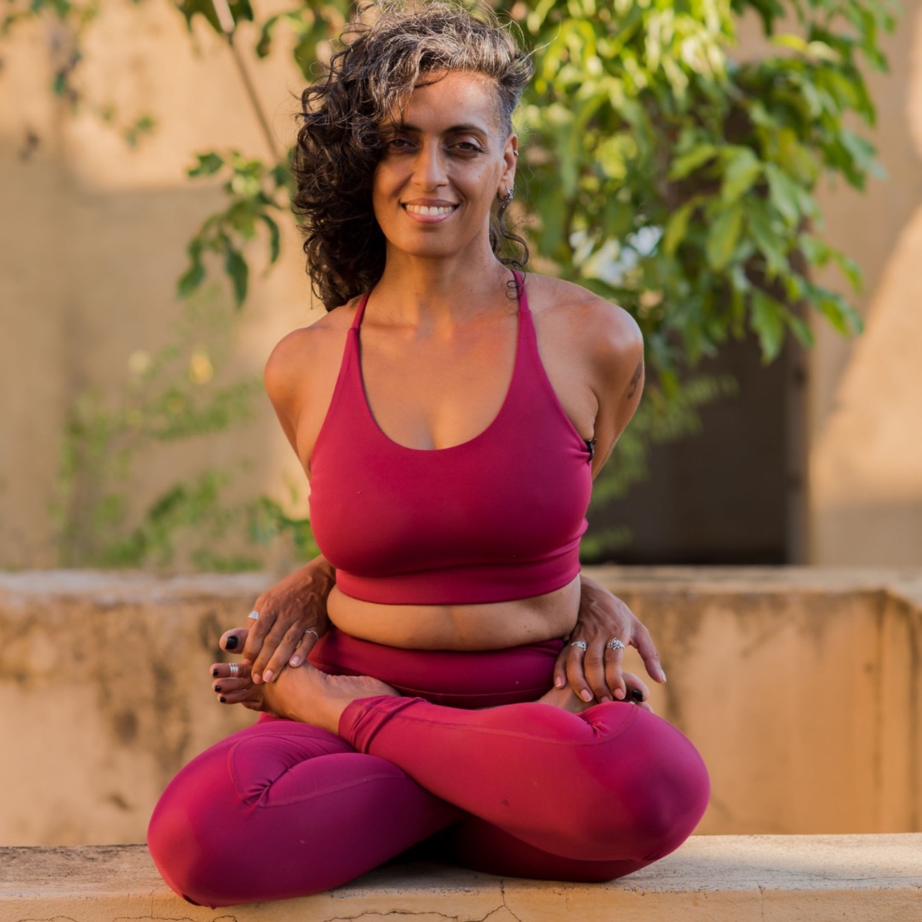 Tara seated in lotus pose